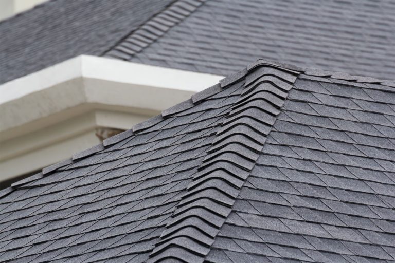 Edge,Of,Roof,Shingles,On,Top,Of,The,House,,Dark